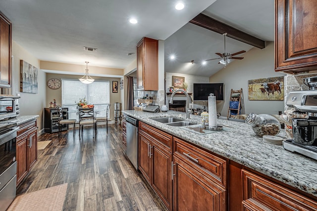 211 Willow Creek Ct, Mansfield, TX 76063 - kitchen featuring stainless steel dishwasher, a ceiling fan, dark wood finished floors, light stone counters, and pendant lighting