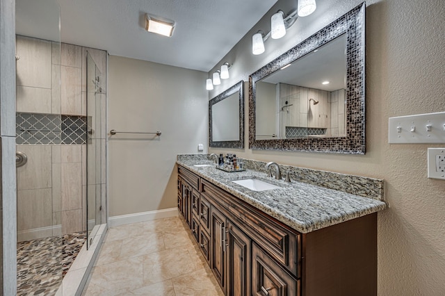 211 Willow Creek Ct, Mansfield, TX 76063 - full bathroom featuring double vanity, a tile shower, and tile patterned flooring