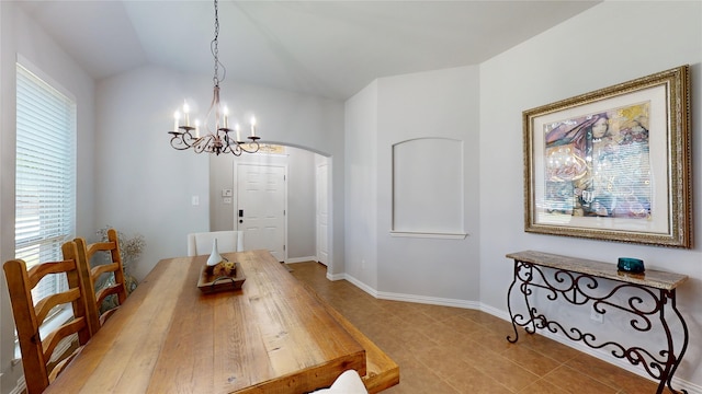 751 Kirby Dr, Argyle, TX 76226 - dining space with a chandelier, arched walkways, and vaulted ceiling