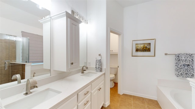 751 Kirby Dr, Argyle, TX 76226 - full bathroom with double vanity, a garden tub, a shower stall, and tile patterned floors