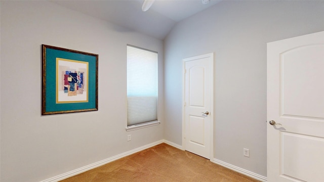 751 Kirby Dr, Argyle, TX 76226 - unfurnished bedroom featuring light colored carpet and vaulted ceiling