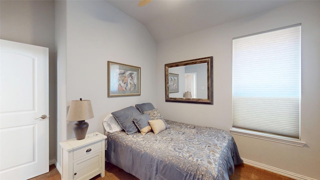 751 Kirby Dr, Argyle, TX 76226 - carpeted bedroom with vaulted ceiling and baseboards
