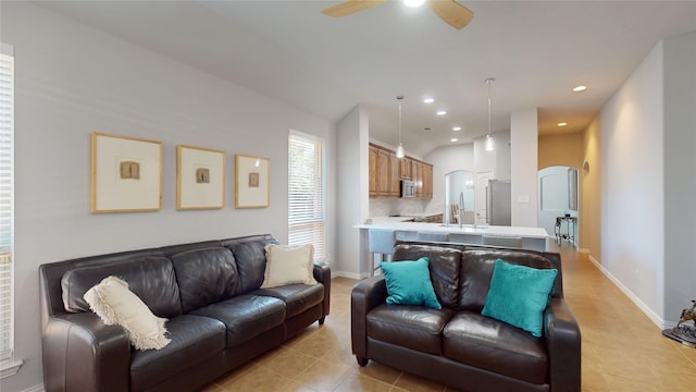 751 Kirby Dr, Argyle, TX 76226 - living area featuring arched walkways, light tile patterned floors, a ceiling fan, and recessed lighting