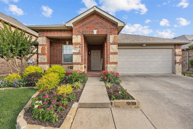 2316 Cavalry Dr, Fort Worth, TX 76177 - view of front facade with brick siding, concrete driveway, a garage, and stone siding