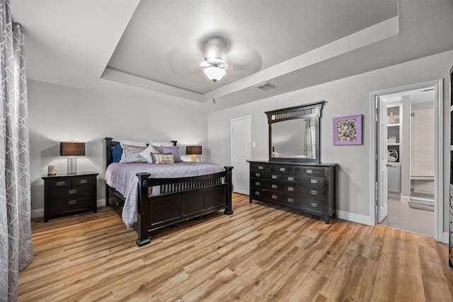 2316 Cavalry Dr, Fort Worth, TX 76177 - bedroom with a raised ceiling and wood finished floors