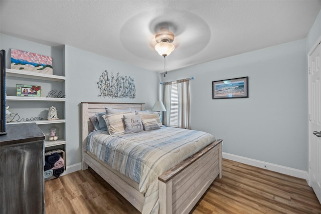 2316 Cavalry Dr, Fort Worth, TX 76177 - bedroom with wood finished floors and ceiling fan