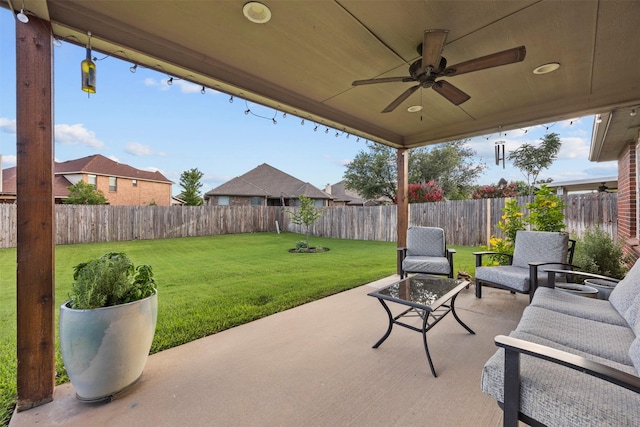 2316 Cavalry Dr, Fort Worth, TX 76177 - fenced backyard featuring a patio, ceiling fan, and an outdoor living space