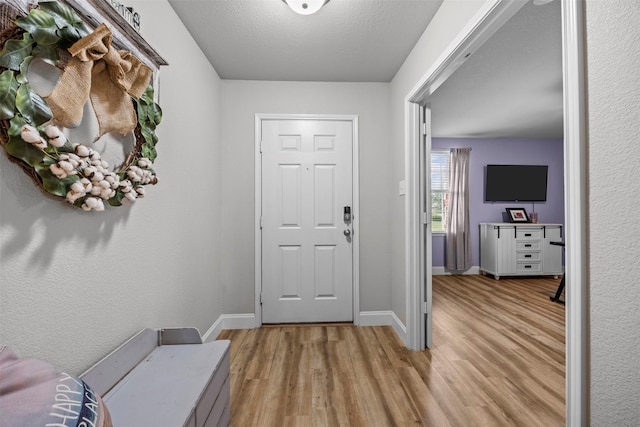 2316 Cavalry Dr, Fort Worth, TX 76177 - foyer featuring light wood-type flooring and baseboards