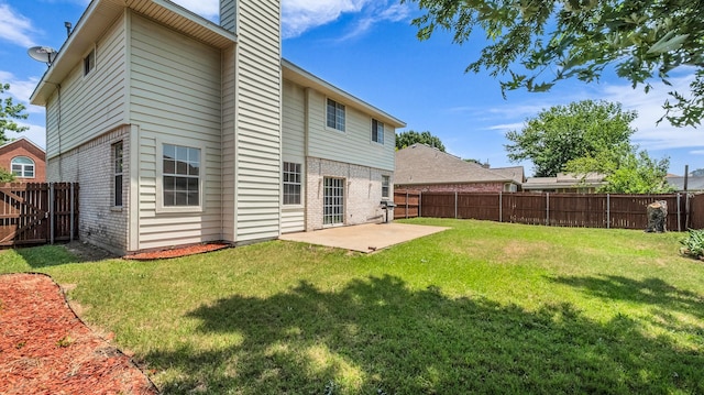 836 Snapdragon Ln, Plano, TX 75075 - rear view of house with a patio area, brick siding, a fenced backyard, and a chimney