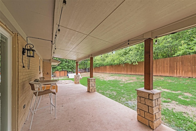 4204 Shipley Ct, Benbrook, TX 76116 - fenced backyard featuring a patio and a shed