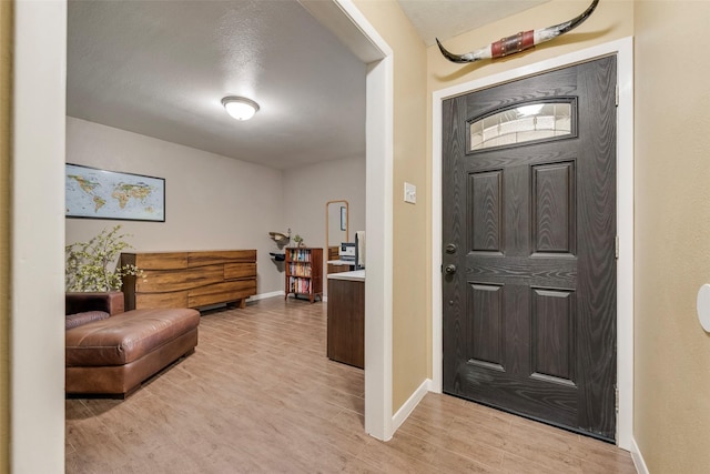 4204 Shipley Ct, Benbrook, TX 76116 - entrance foyer featuring light wood-style floors and baseboards