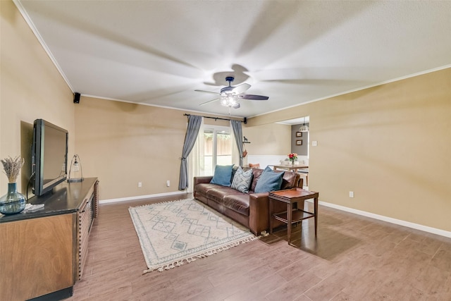 4204 Shipley Ct, Benbrook, TX 76116 - living area featuring crown molding, a ceiling fan, and light wood finished floors