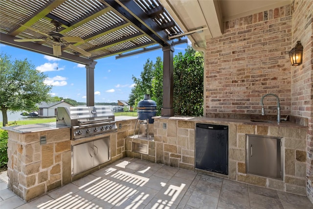 229 Lakeside Dr, Malakoff, TX 75148 - view of patio / terrace featuring an outdoor kitchen, a pergola, and a ceiling fan