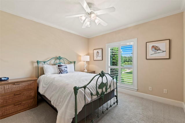 229 Lakeside Dr, Malakoff, TX 75148 - carpeted bedroom featuring ornamental molding and a ceiling fan