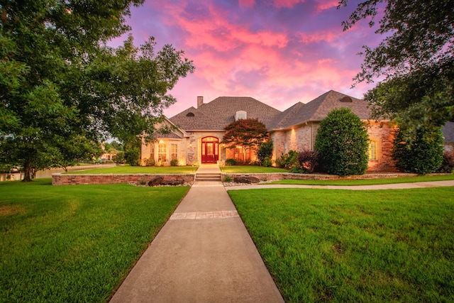 229 Lakeside Dr, Malakoff, TX 75148 - french provincial home with a front lawn, a chimney, and brick siding