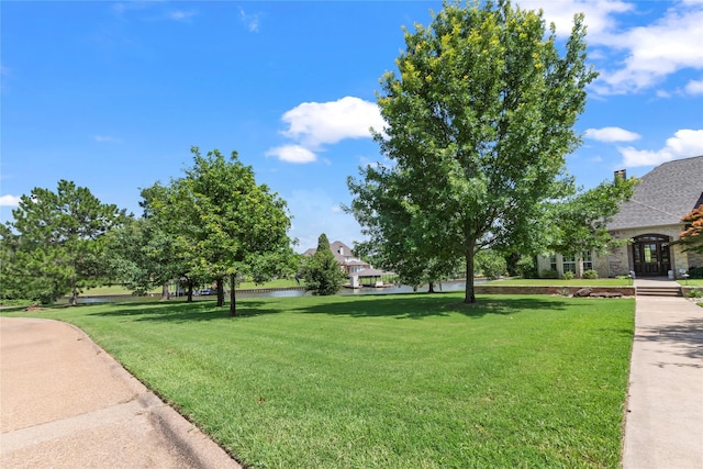 229 Lakeside Dr, Malakoff, TX 75148 - view of property's community with a yard and a water view