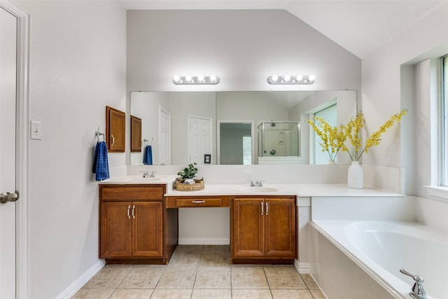 426 Bell Dr, Wylie, TX 75098 - full bath with double vanity, a bath, a shower stall, tile patterned floors, and lofted ceiling