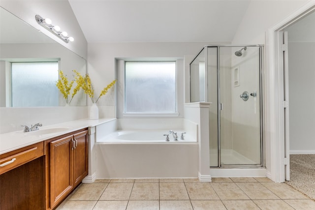 426 Bell Dr, Wylie, TX 75098 - bathroom featuring vanity, a garden tub, a stall shower, lofted ceiling, and tile patterned floors