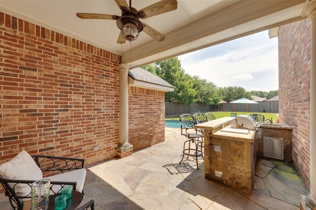 426 Bell Dr, Wylie, TX 75098 - fenced backyard with a patio area, a ceiling fan, and a grill