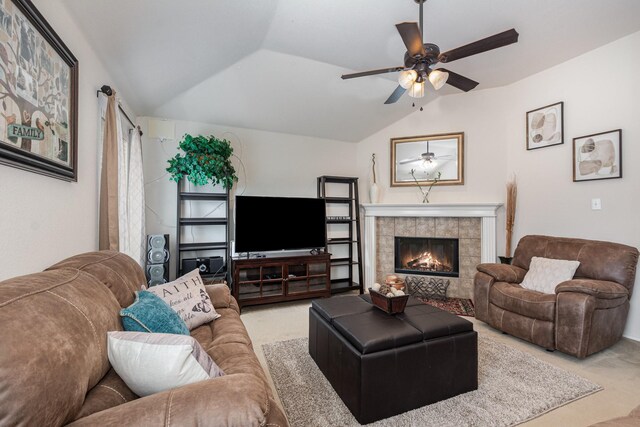 1232 Morning Dove, Aubrey, TX 76227 - living area with a ceiling fan, carpet floors, vaulted ceiling, and a tile fireplace