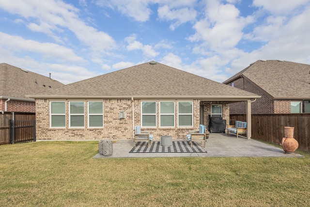 1728 Karma Dr, Wylie, TX 75098 - back of property featuring brick siding, a fenced backyard, and roof with shingles
