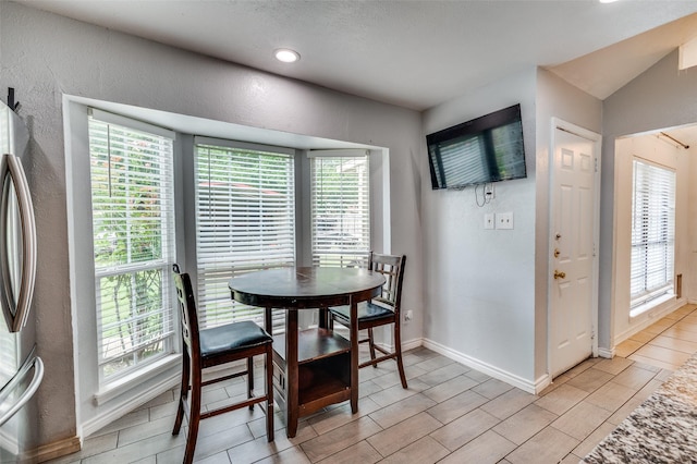 3412 Forest Creek Dr, Fort Worth, TX 76123 - dining room with a textured wall, recessed lighting, and wood tiled floors