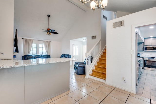 3412 Forest Creek Dr, Fort Worth, TX 76123 - kitchen with appliances with stainless steel finishes, open floor plan, high vaulted ceiling, ceiling fan, and light stone countertops