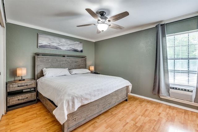 3412 Forest Creek Dr, Fort Worth, TX 76123 - bedroom with a textured wall, light wood-style floors, and ceiling fan