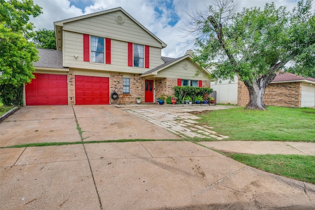 3412 Forest Creek Dr, Fort Worth, TX 76123 - view of front of home featuring concrete driveway, brick siding, and a front yard