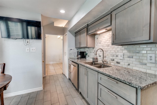 3412 Forest Creek Dr, Fort Worth, TX 76123 - kitchen featuring decorative backsplash, dishwasher, and light stone counters