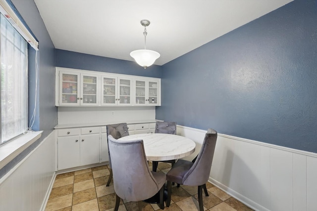6123 Moonglow Dr, Dallas, TX 75241 - dining room featuring a wainscoted wall