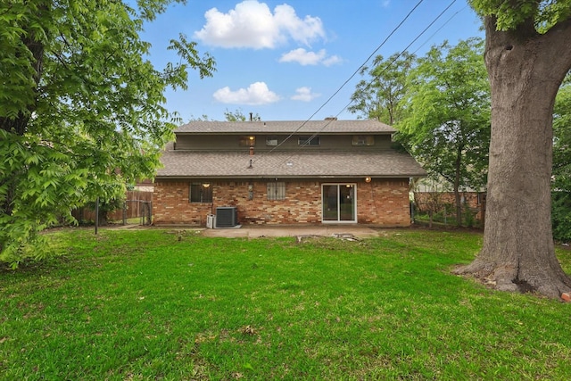 6123 Moonglow Dr, Dallas, TX 75241 - back of house featuring a patio, brick siding, and roof with shingles
