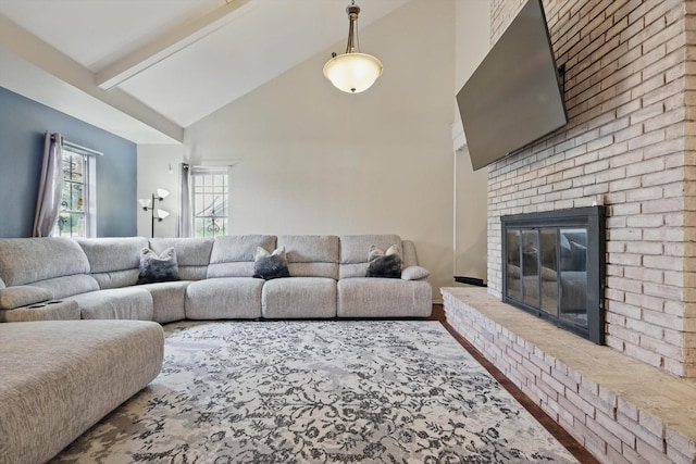 6123 Moonglow Dr, Dallas, TX 75241 - living area with high vaulted ceiling, a fireplace, beam ceiling, and wood finished floors