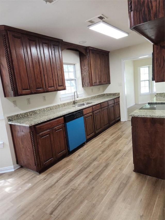 1721 Monaco Dr, Arlington, TX 76010 - kitchen with dishwasher, light wood-type flooring, exhaust hood, and healthy amount of natural light