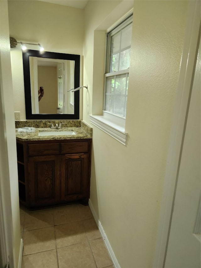 1721 Monaco Dr, Arlington, TX 76010 - bathroom featuring vanity and tile patterned floors