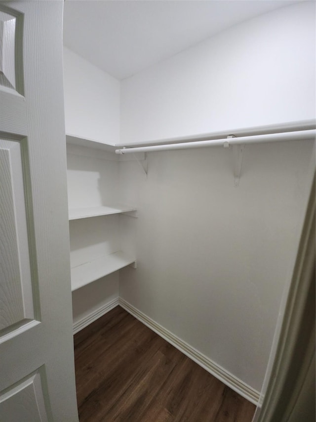1721 Monaco Dr, Arlington, TX 76010 - spacious closet featuring dark wood finished floors