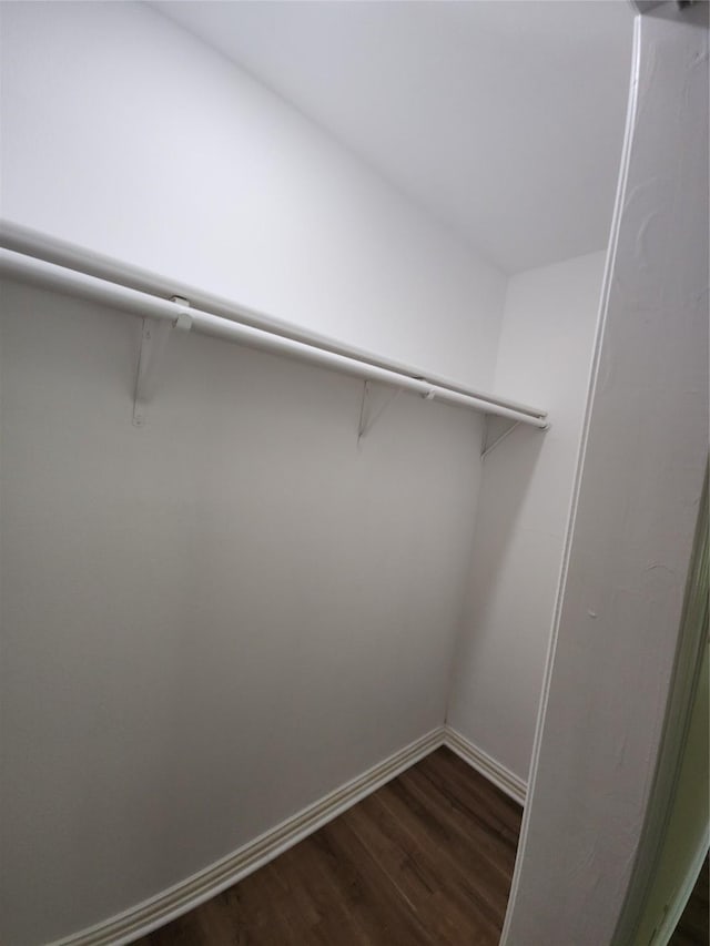 1721 Monaco Dr, Arlington, TX 76010 - spacious closet featuring dark wood finished floors