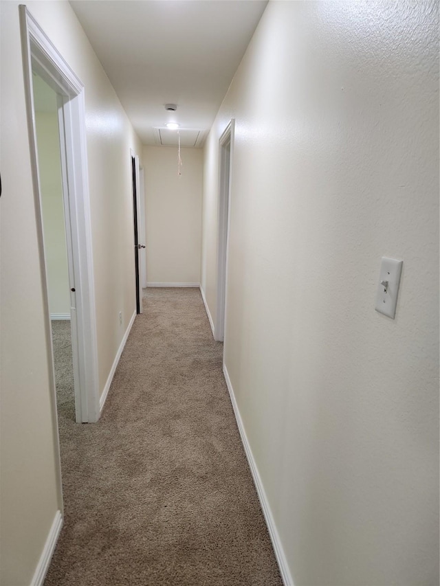 1721 Monaco Dr, Arlington, TX 76010 - corridor featuring attic access and carpet