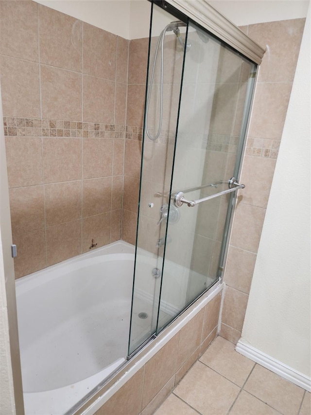 1721 Monaco Dr, Arlington, TX 76010 - full bathroom with tiled shower / bath combo and tile patterned flooring
