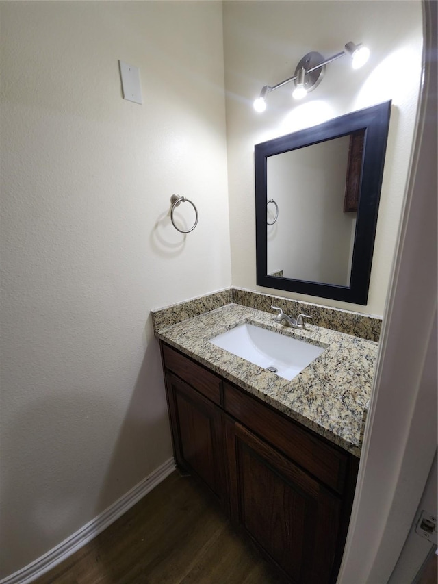 1721 Monaco Dr, Arlington, TX 76010 - bathroom featuring vanity and wood finished floors