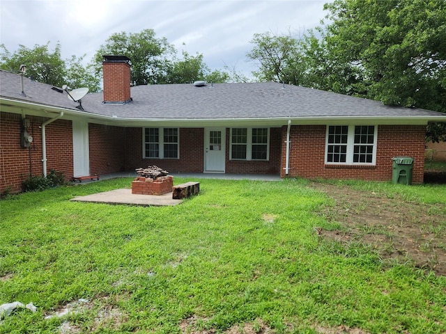 1721 Monaco Dr, Arlington, TX 76010 - single story home with a patio area, a chimney, a front lawn, and brick siding
