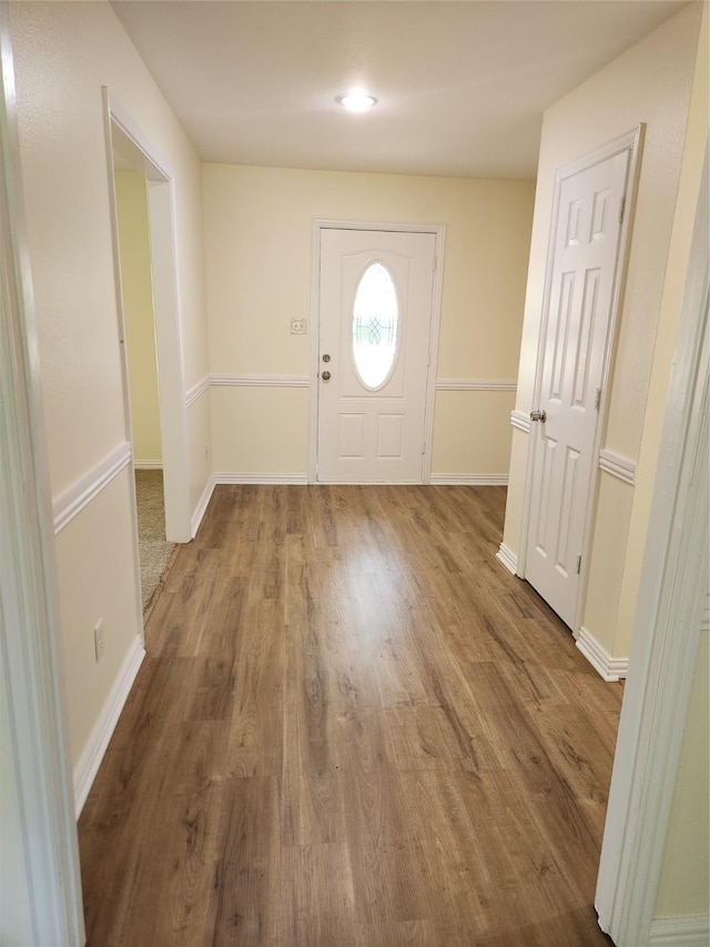 1721 Monaco Dr, Arlington, TX 76010 - foyer entrance featuring wood finished floors and baseboards