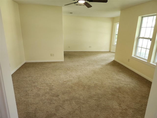 1721 Monaco Dr, Arlington, TX 76010 - carpeted spare room featuring a ceiling fan and baseboards