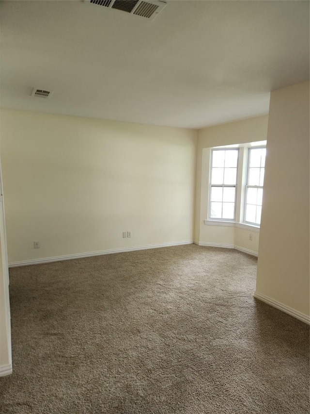 1721 Monaco Dr, Arlington, TX 76010 - carpeted empty room featuring baseboards
