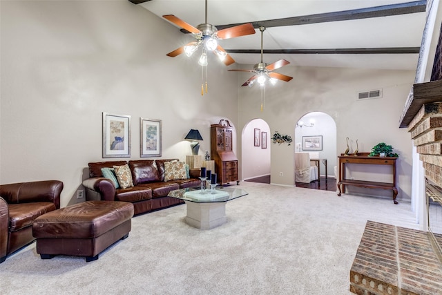 9662 Bryson Dr Unit A, Dallas, TX 75238 - carpeted living room with arched walkways, a ceiling fan, high vaulted ceiling, and beamed ceiling