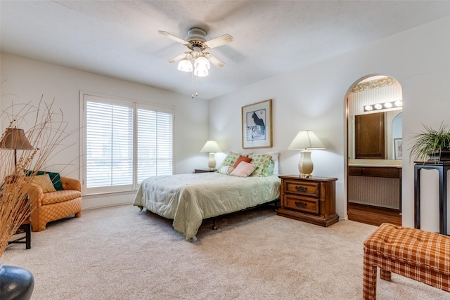 9662 Bryson Dr Unit A, Dallas, TX 75238 - bedroom with carpet, ensuite bath, and ceiling fan