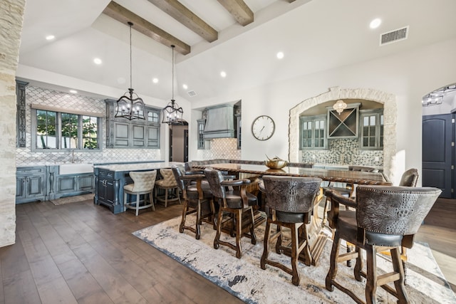 144 Condor Vw, Weatherford, TX 76087 - dining room with recessed lighting, dark wood-style floors, a chandelier, and arched walkways