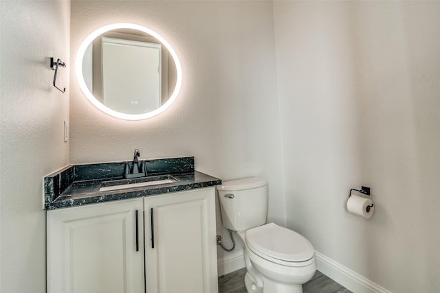 18023 Lake Ray Hubbard Dr, Forney, TX 75126 - bathroom featuring vanity and toilet