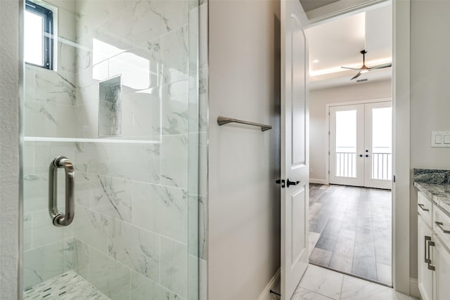 18023 Lake Ray Hubbard Dr, Forney, TX 75126 - full bath with french doors, marble finish flooring, healthy amount of natural light, and a marble finish shower