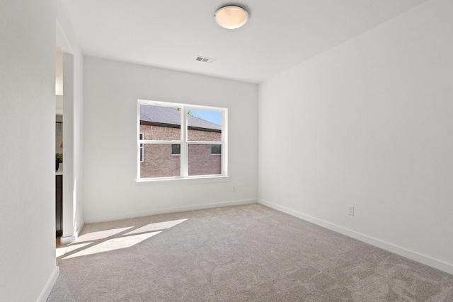 2105 Oak Haven Ct, Garland, TX 75044 - empty room with carpet flooring and baseboards